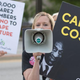 Brandy Betts gathers with other protesters outside Bill Cosby’s Far From Finished tour at Cobb Energy Performing Arts Center May 2, 2015, in Atlanta.
Marcus Ingram/Getty Images